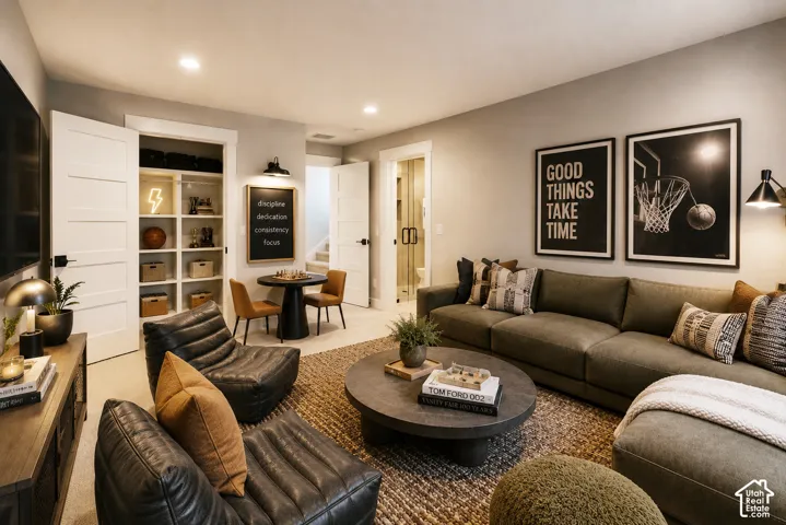 Spacious recreation room featuring recessed lighting and neutral wall tones