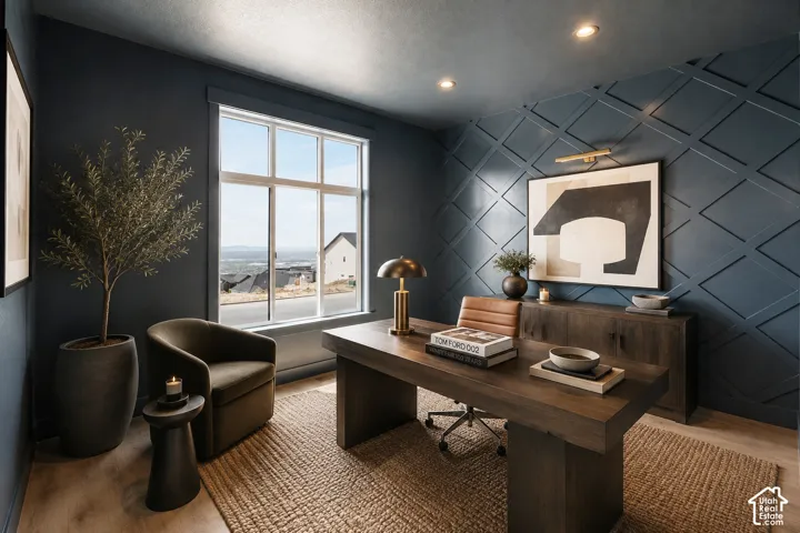 Spacious room featuring a large multi-pane window, decorative accent wall with diamond paneling, recessed ceiling lighting, and wood-finish flooring