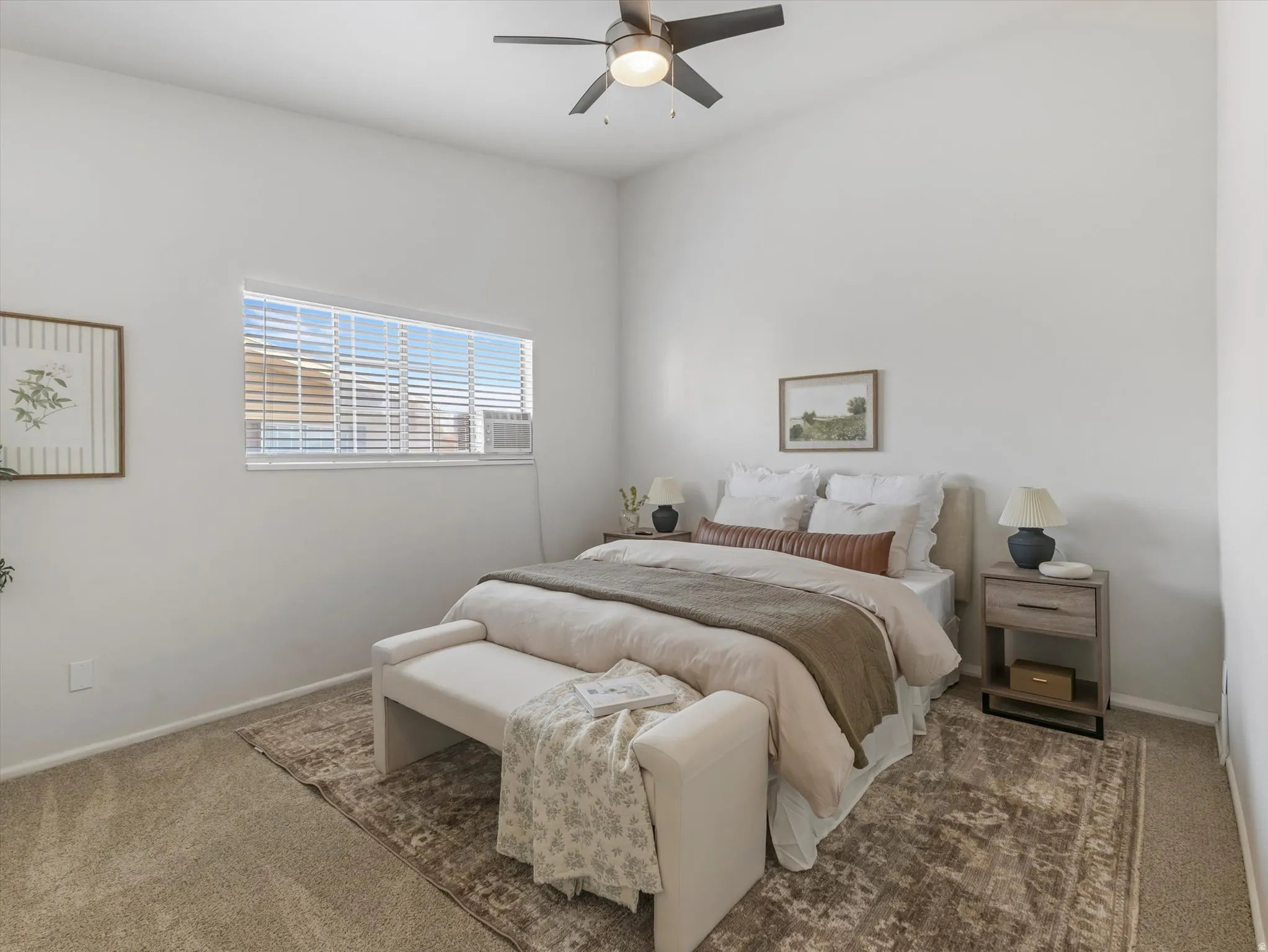 Bedroom featuring a vaulted ceiling and a ceiling fan with integrated lighting