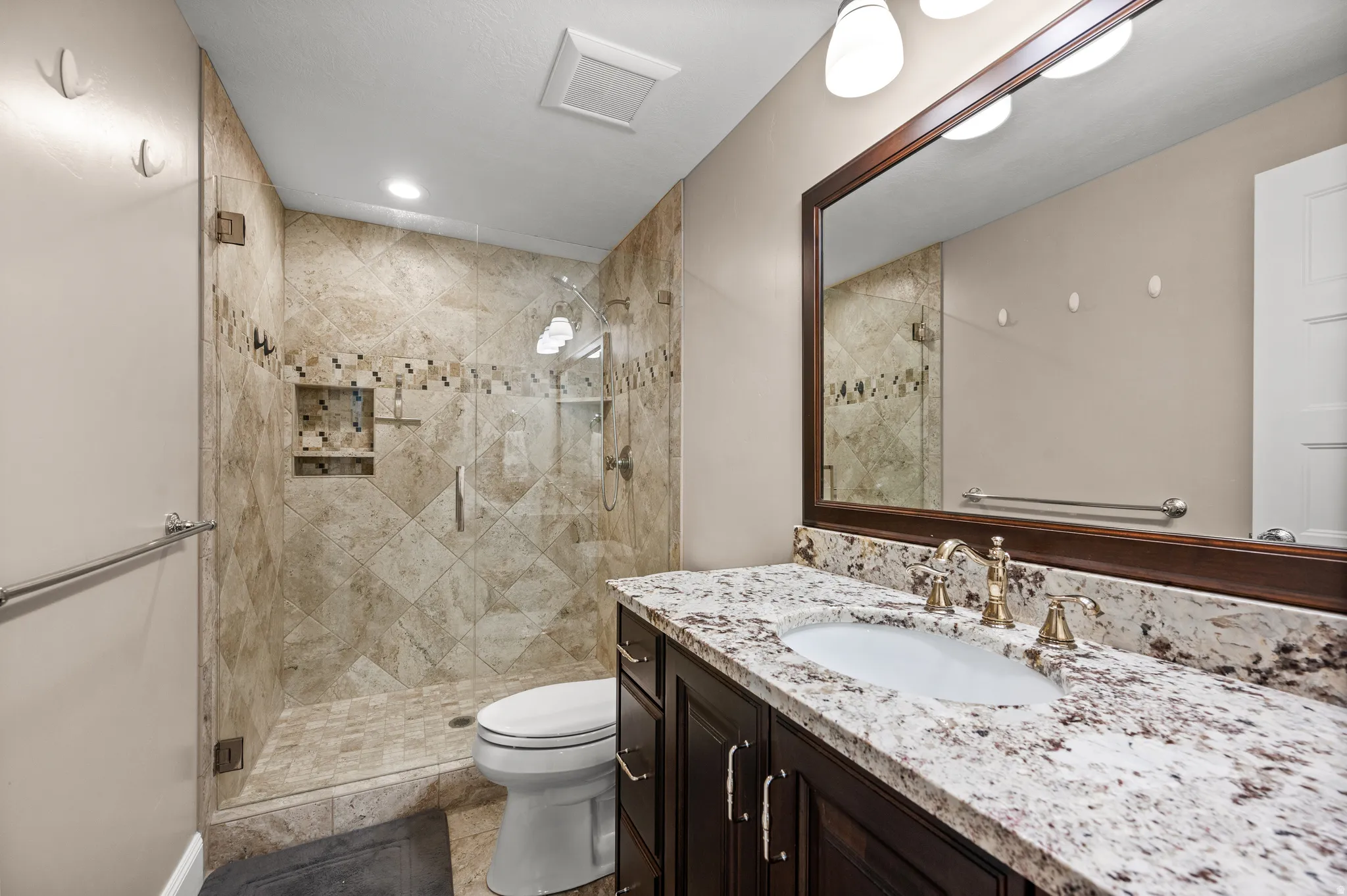 Luxury extends throughout the home, with private ensuite accommodations designed for comfort and convenience.