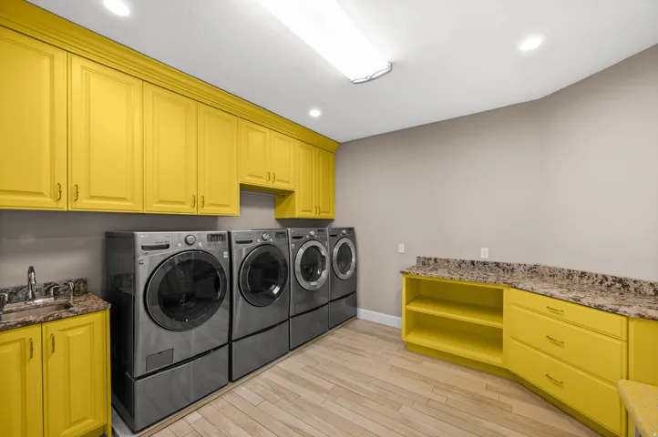 Designed to simplify busy days with abundant workspace, storage, and dual laundry stations.