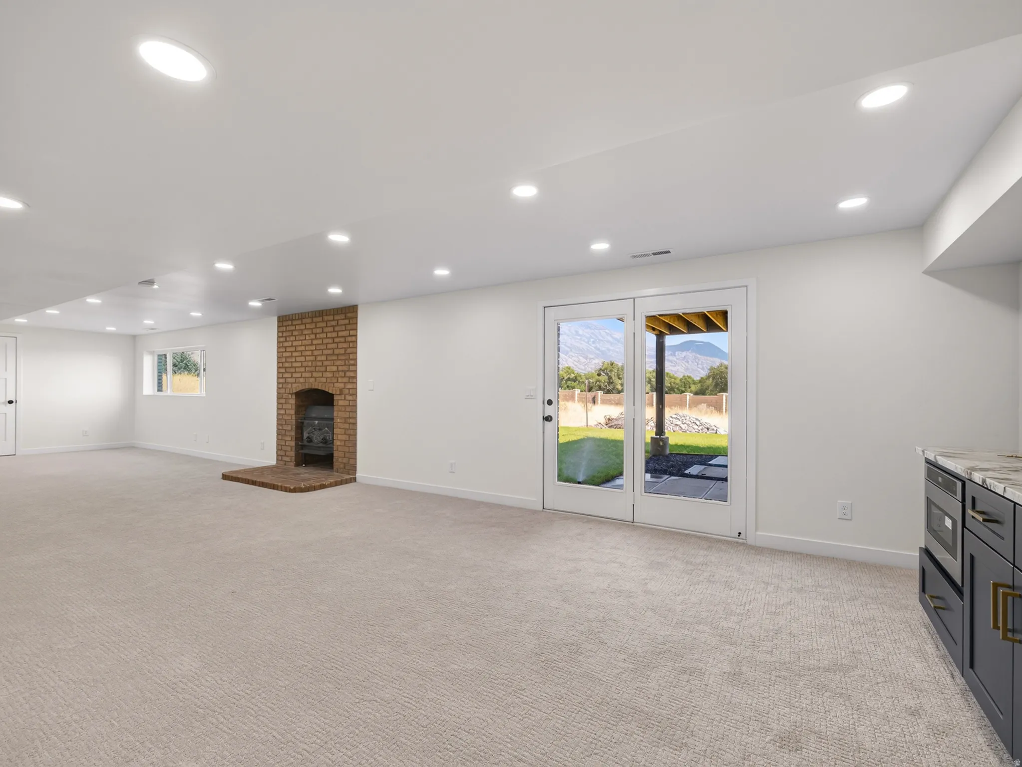 Rec room has walkout entrance to backyard