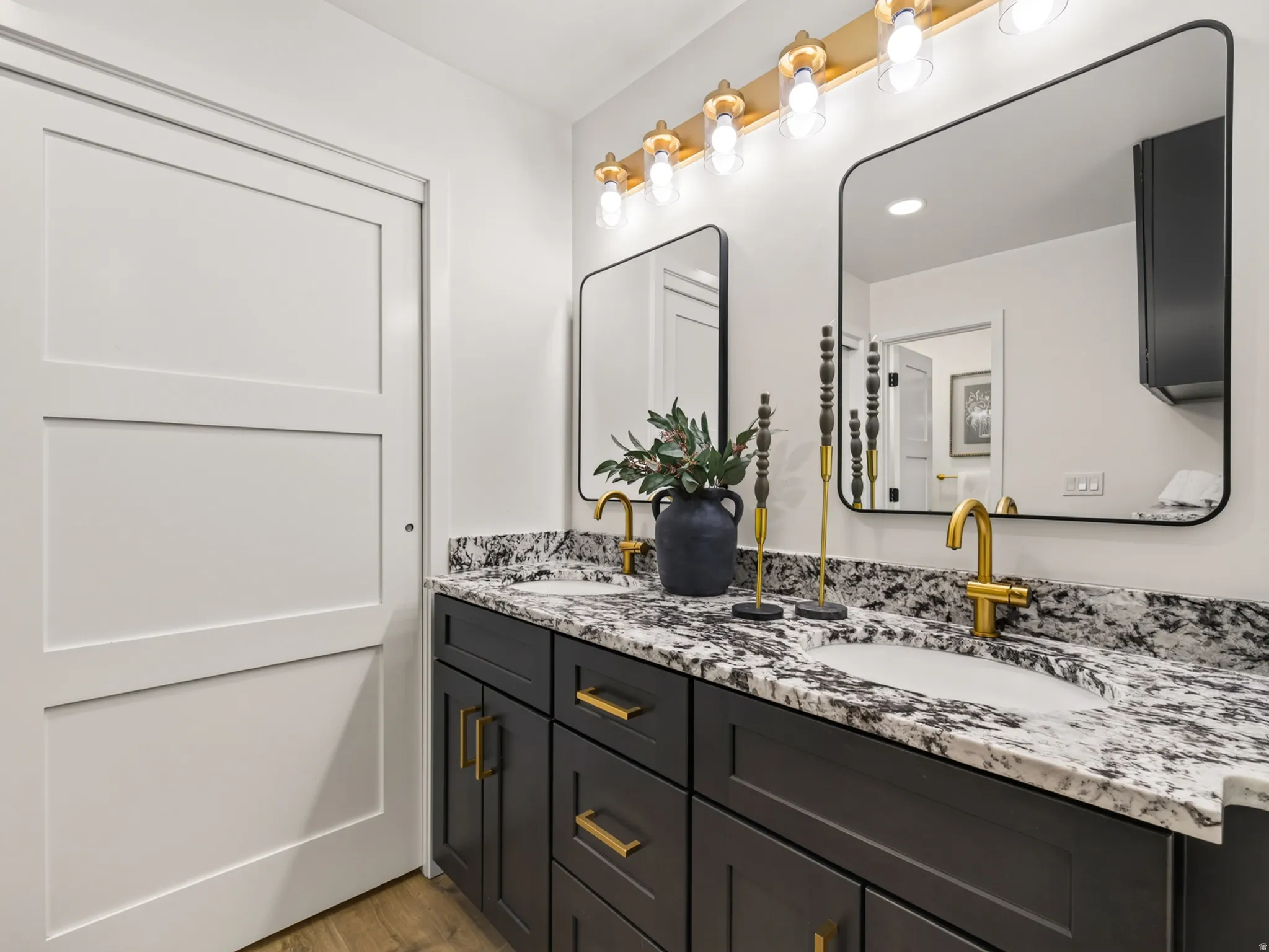 Master bath has beautiful fixtures and granite countertops