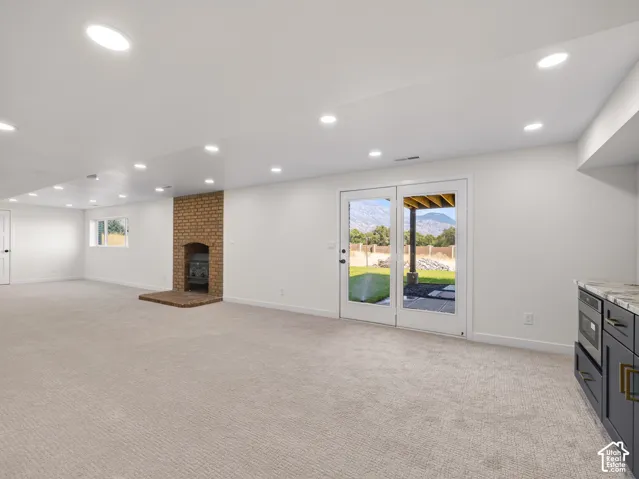 Rec room has walkout entrance to backyard