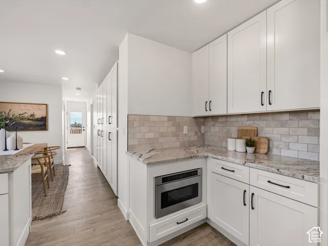 White cabinetry has dovetail joinery and soft-close drawers and doors