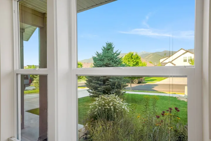 Large window offering views of the surrounding landscape