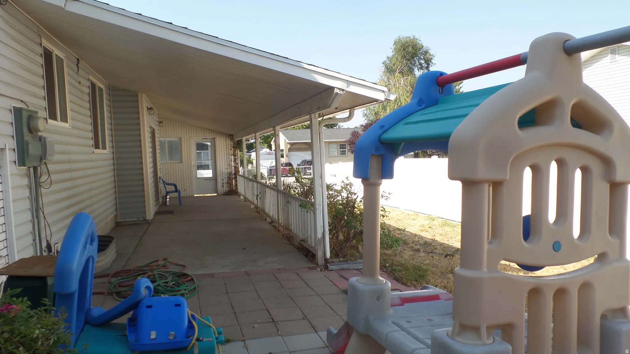 Covered Patio with Storage Shed