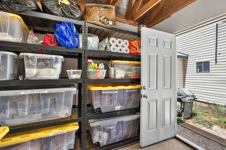 Utility space featuring durable metal shelving units