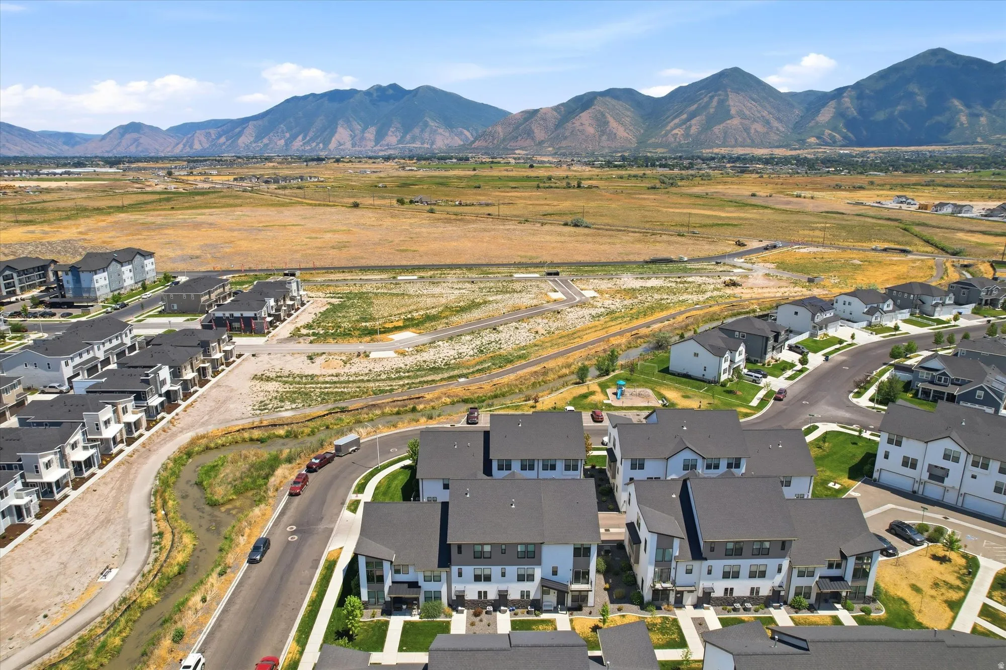 Expansive residential community featuring modern townhomes and single-family residences