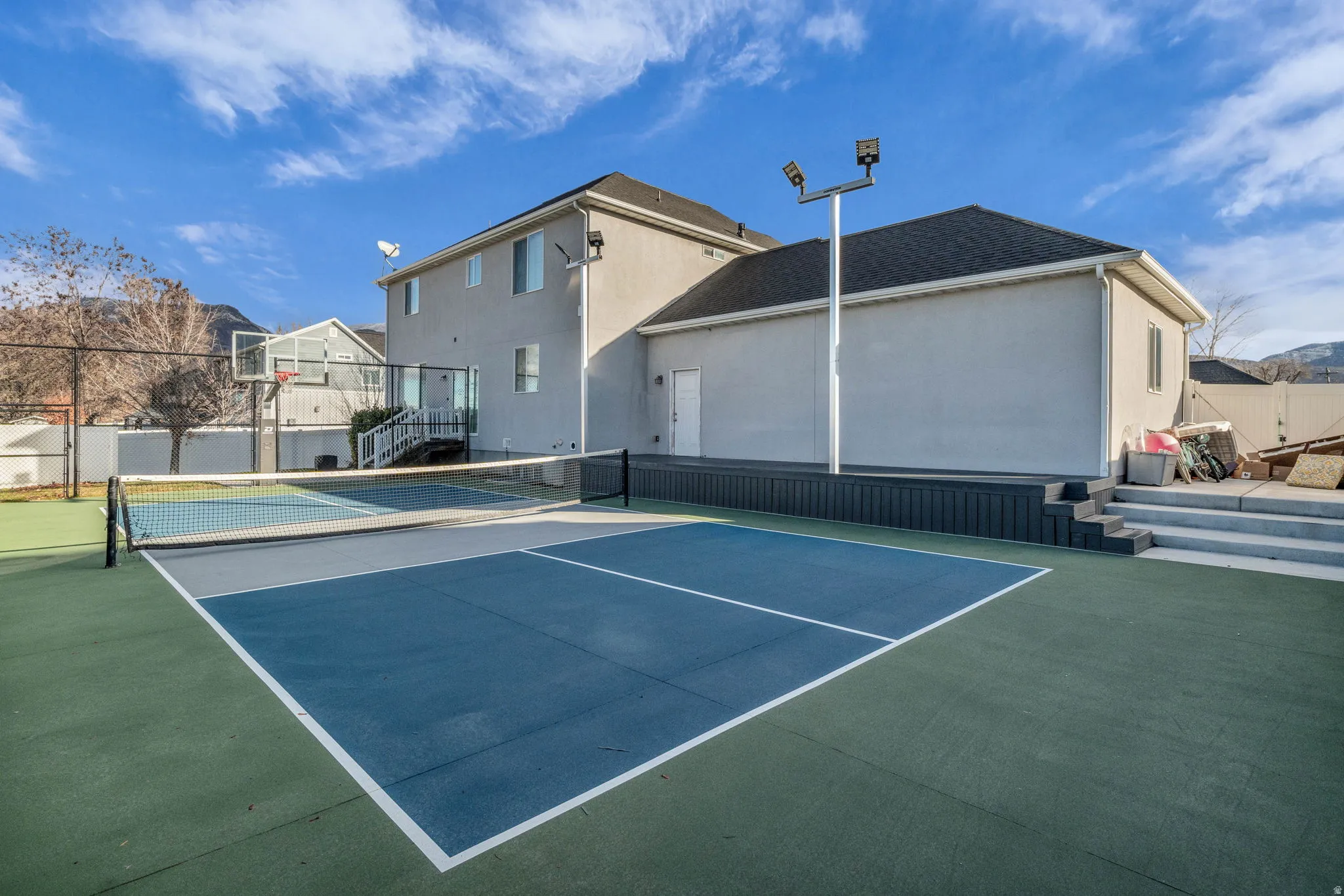 Multi-sport court featuring blue and green surfacing