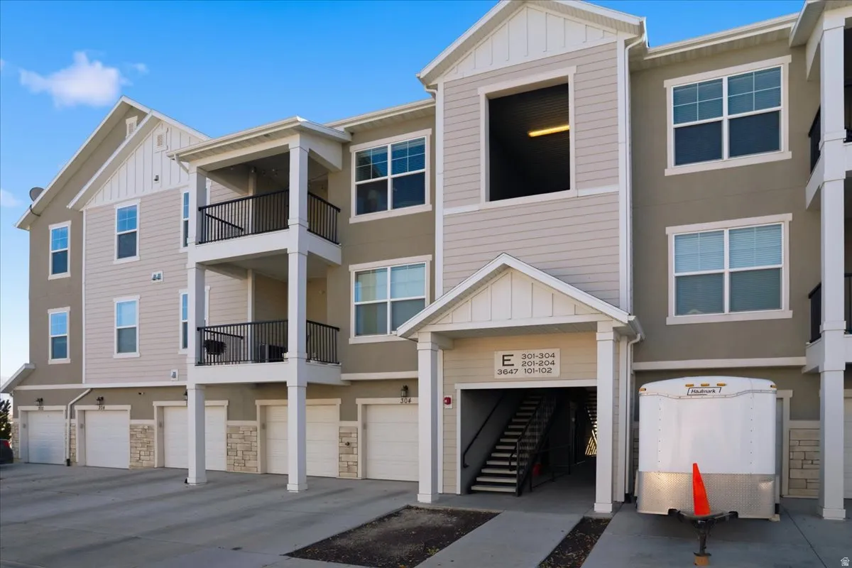 Multi-level building with individual garages and private balconies