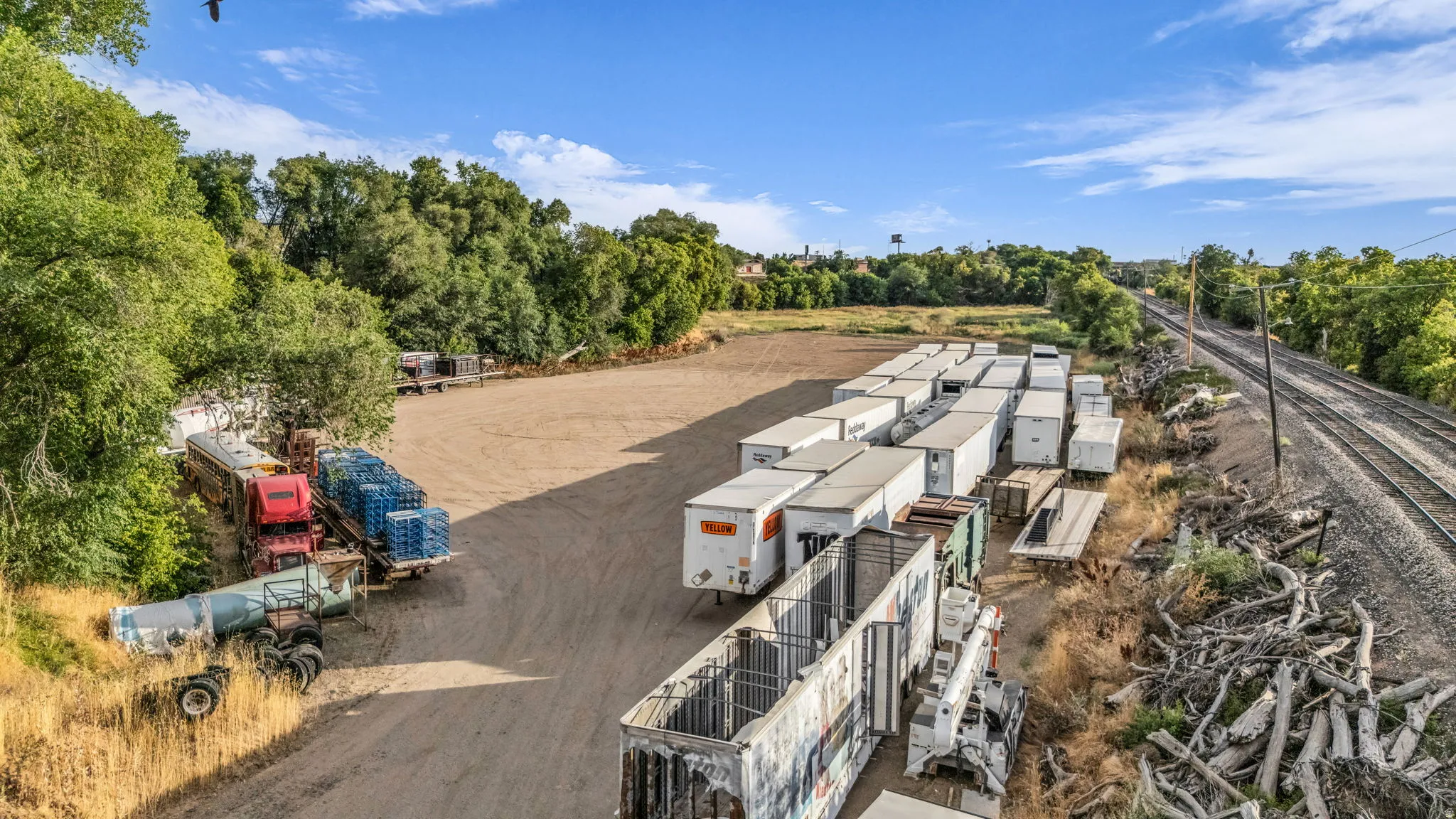 Expansive land parcel featuring a large unpaved lot