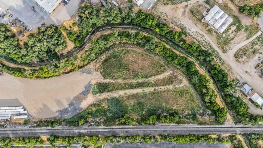 Expansive aerial overview showcasing a sizable land parcel with diverse ground cover