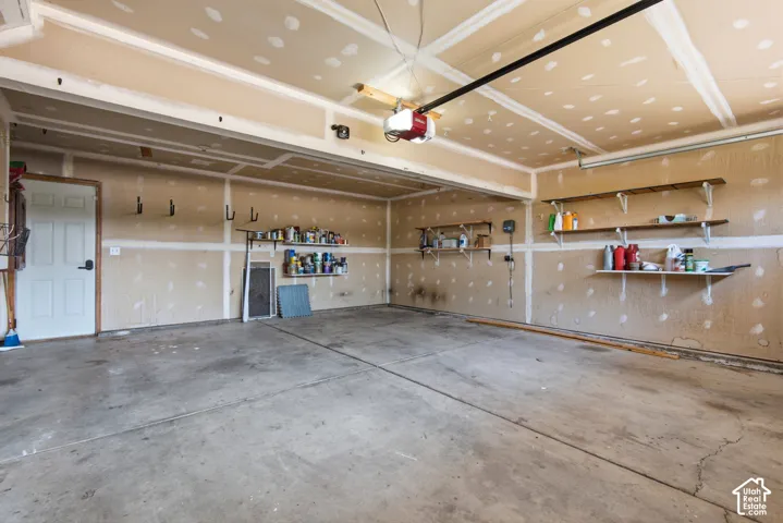 Concrete flooring with an overhead garage door opener