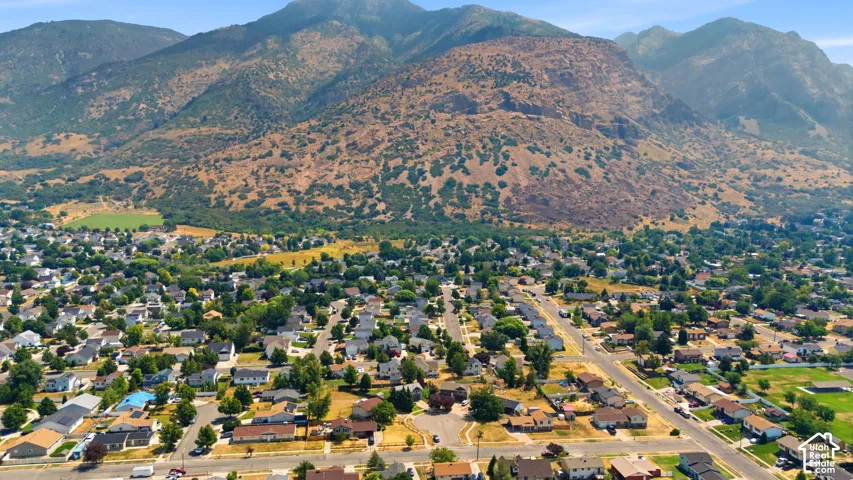 Residential area set against a mountainous backdrop