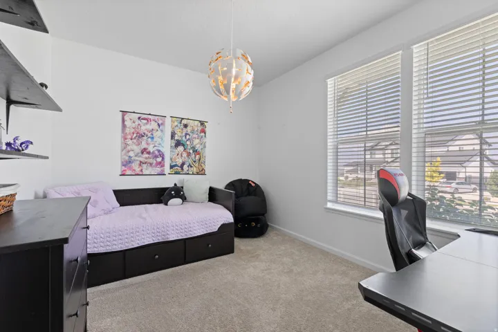 Bright interior space with light wall tones and plush carpeting