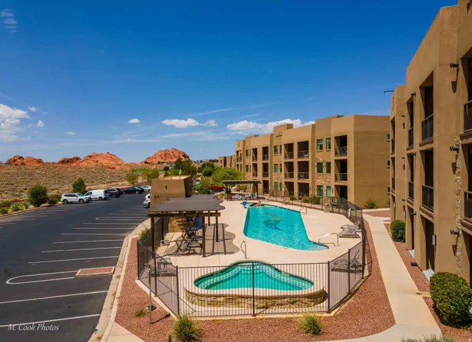 Southwestern-style stucco buildings featuring multiple levels with private balconies