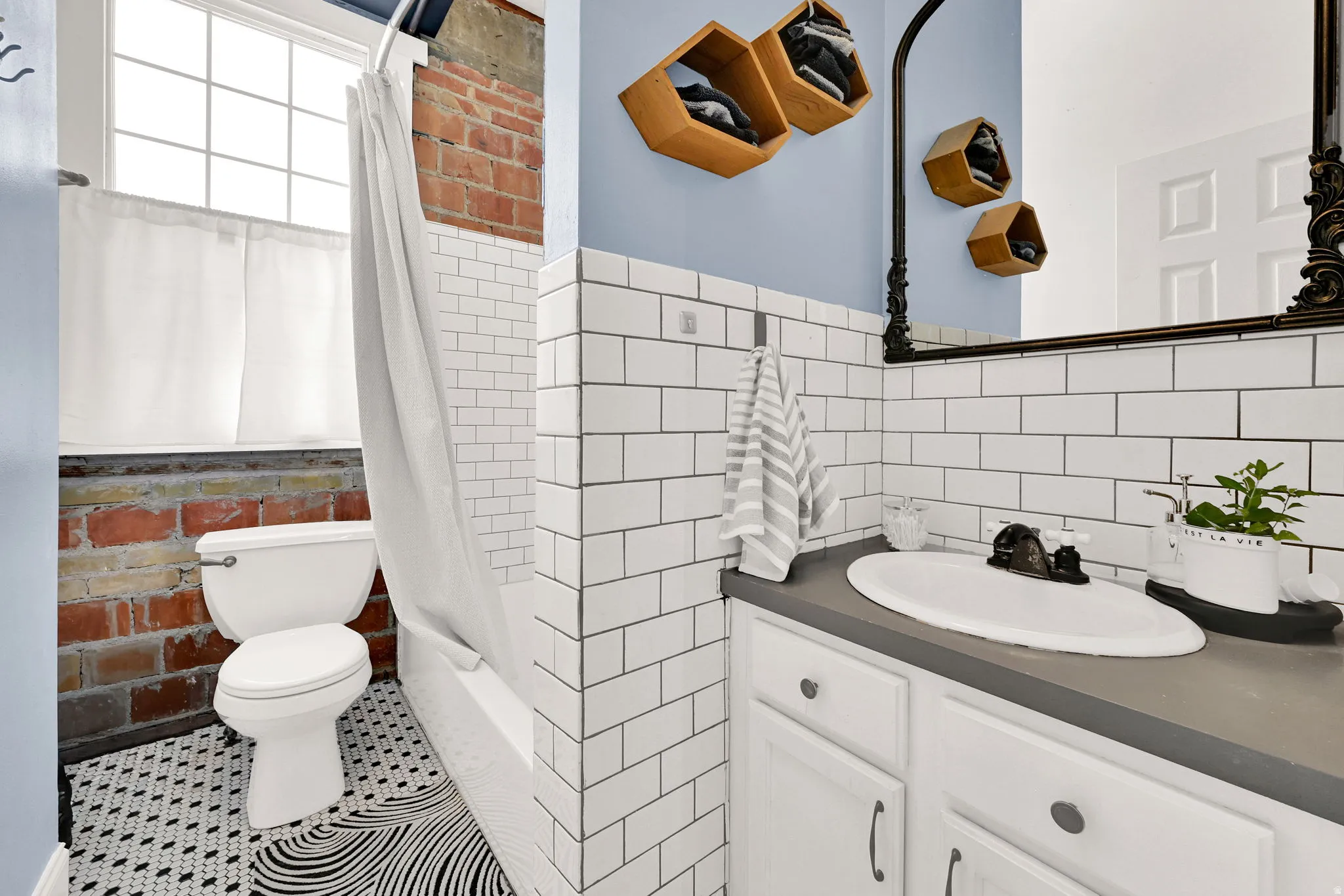 Vaulted ceilings and Exposed Brick!
