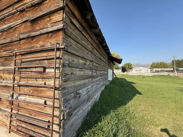 Rough-hewn timber siding horse barn.