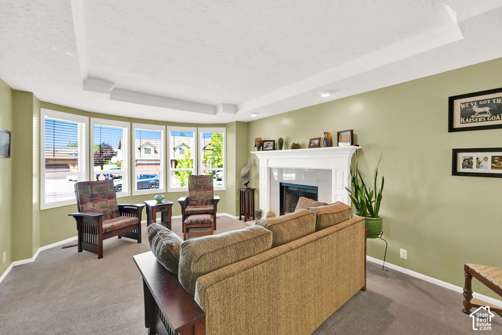 Bright and airy living room bathed in natural light from expansive multi-pane windows
