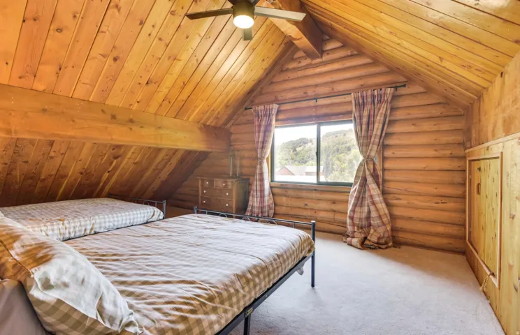 Vaulted wood-paneled ceilings with exposed beams