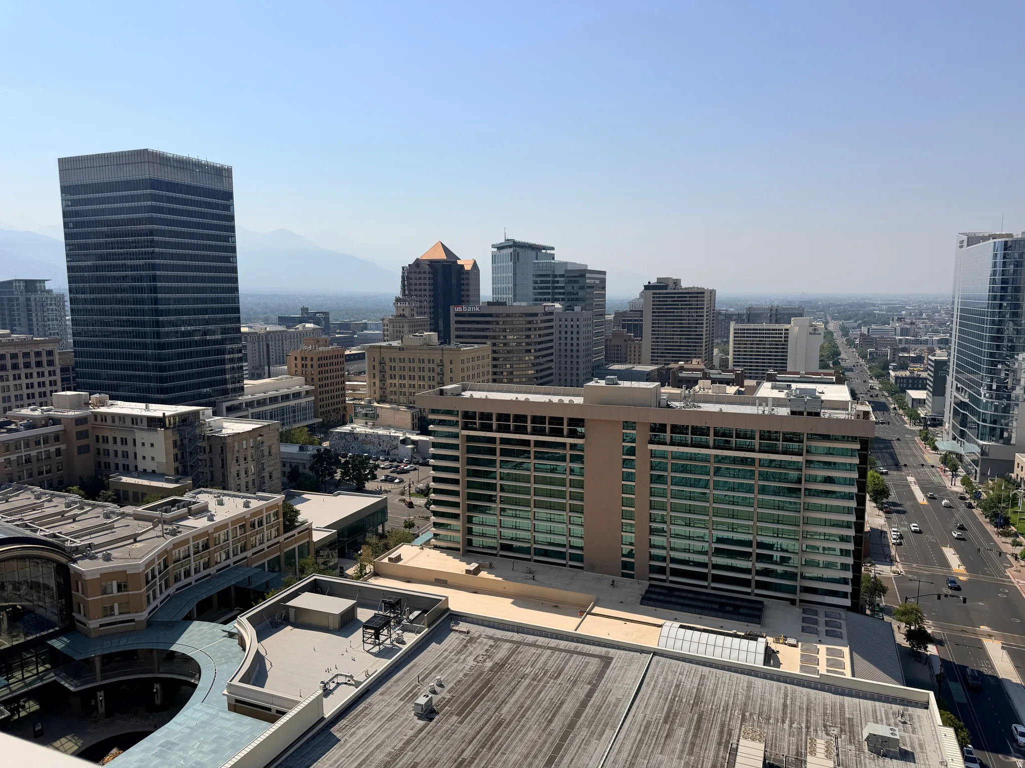 Expansive urban landscape featuring a dense collection of high-rise buildings and city infrastructure