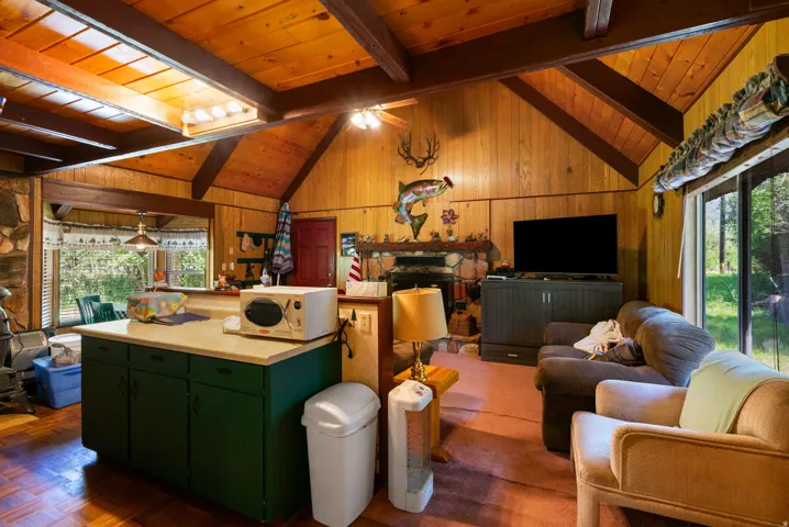 Vaulted wood-paneled ceilings with exposed beams