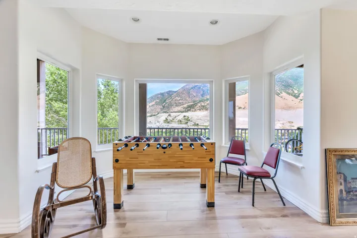 Bay window offering scenic mountain and tree views