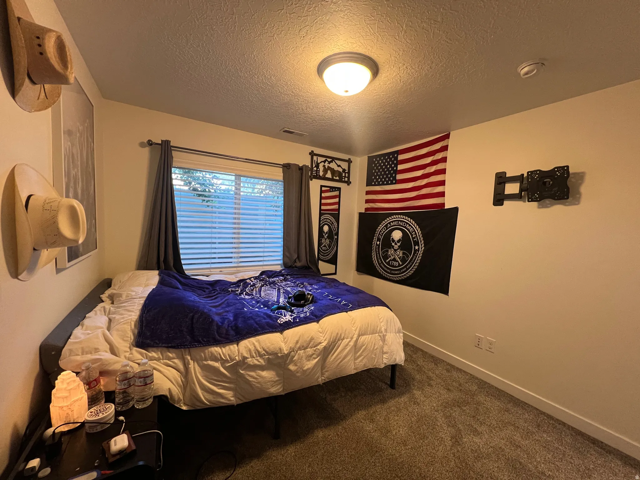 Recessed window with horizontal blinds and drapery panels