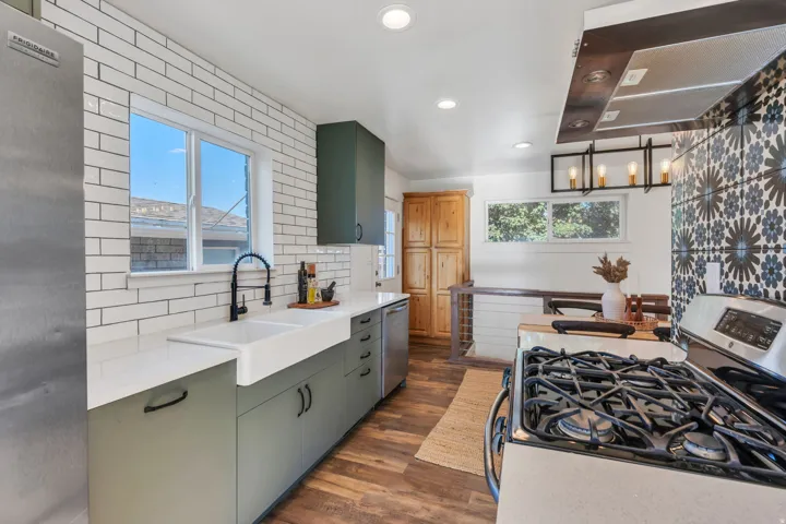 Kitchen featuring wood-finish flooring