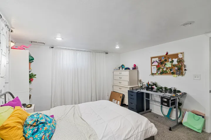 Bedroom featuring recessed lighting and white walls