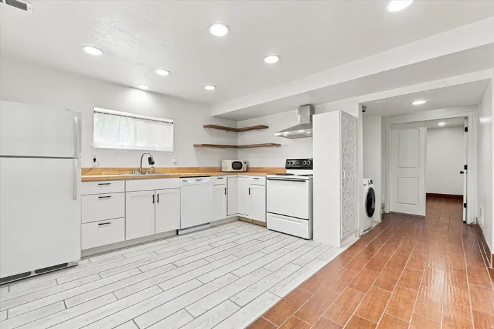 View of basement Kitchen and laundry
