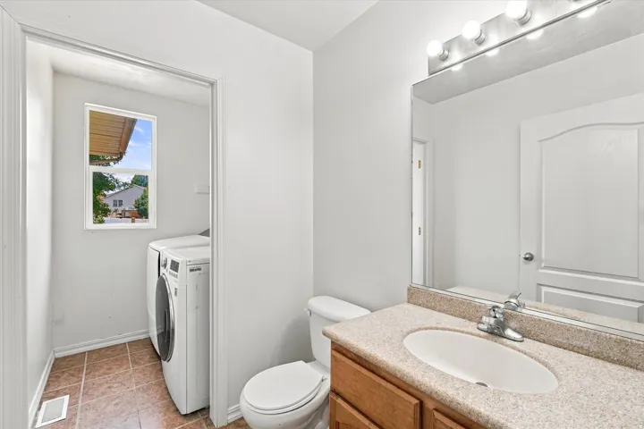 Half bath & laundry room on main level