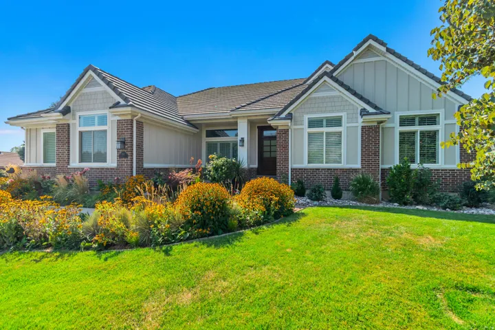 Crafted exterior with brick and siding accents