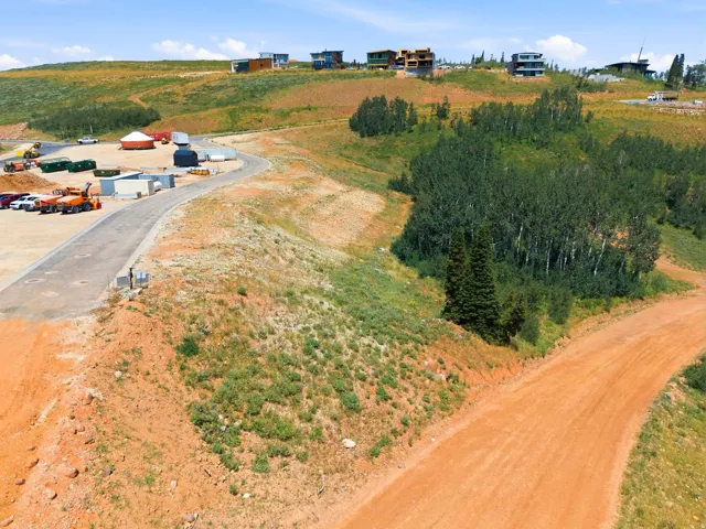 Developing hillside terrain with established paved roadway