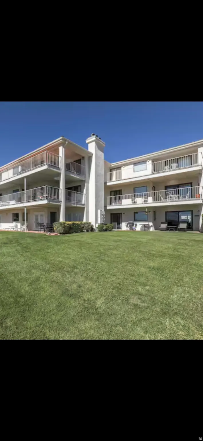 Multi-level building with expansive lawn