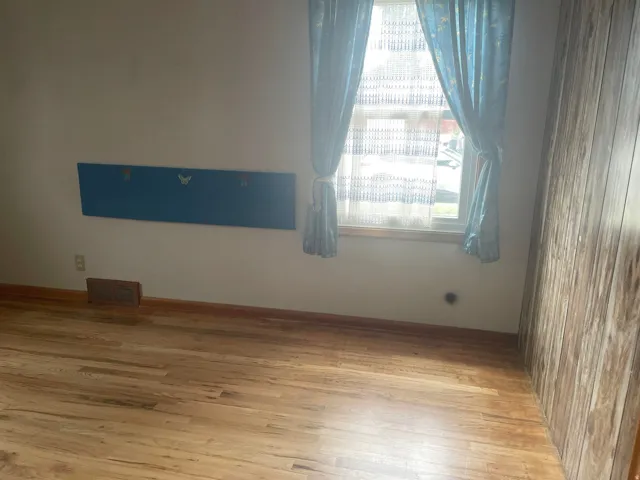 Wood-finish flooring with baseboards