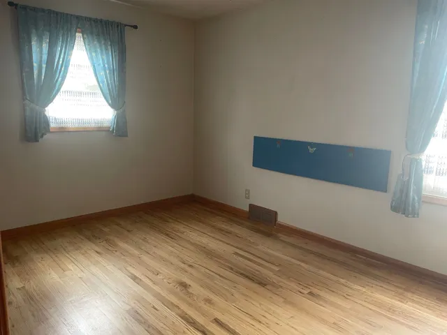 Hardwood flooring throughout