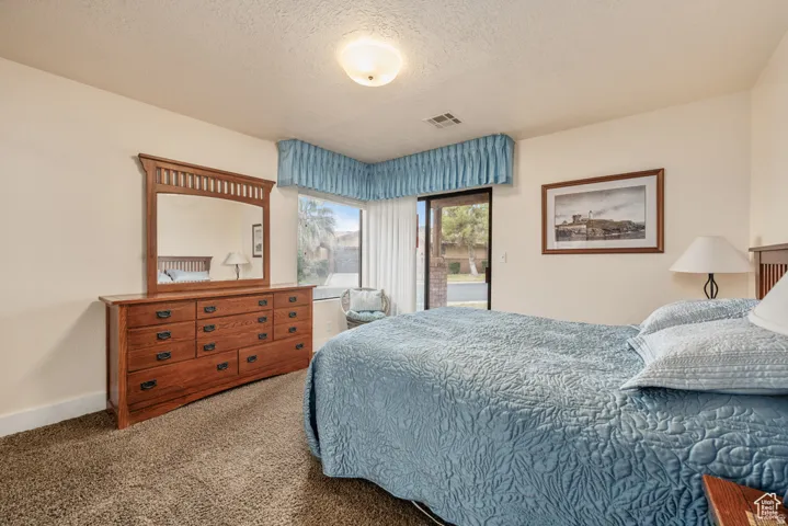 Master bedroom with access to patio