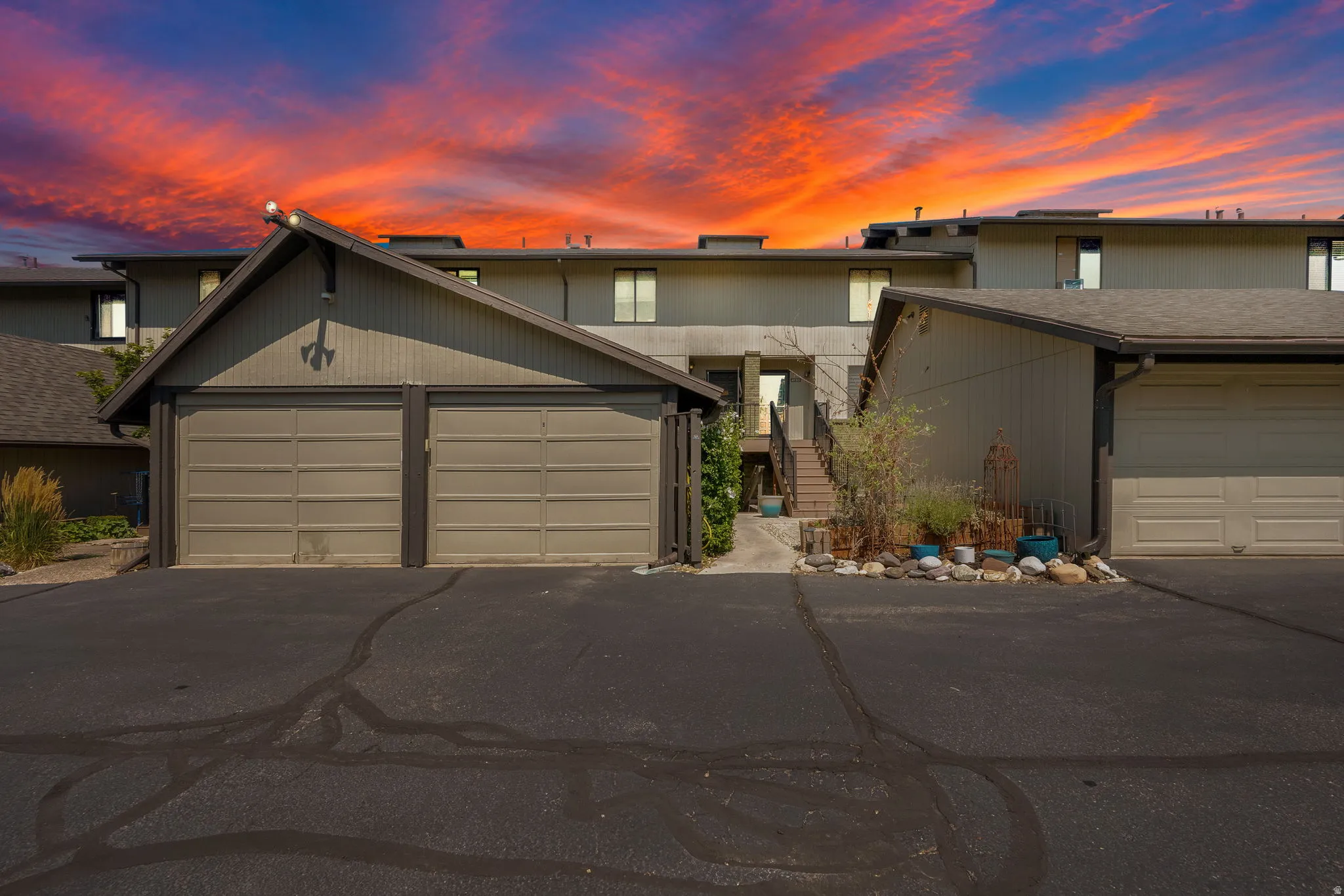 Attached two-car garage with panel doors
