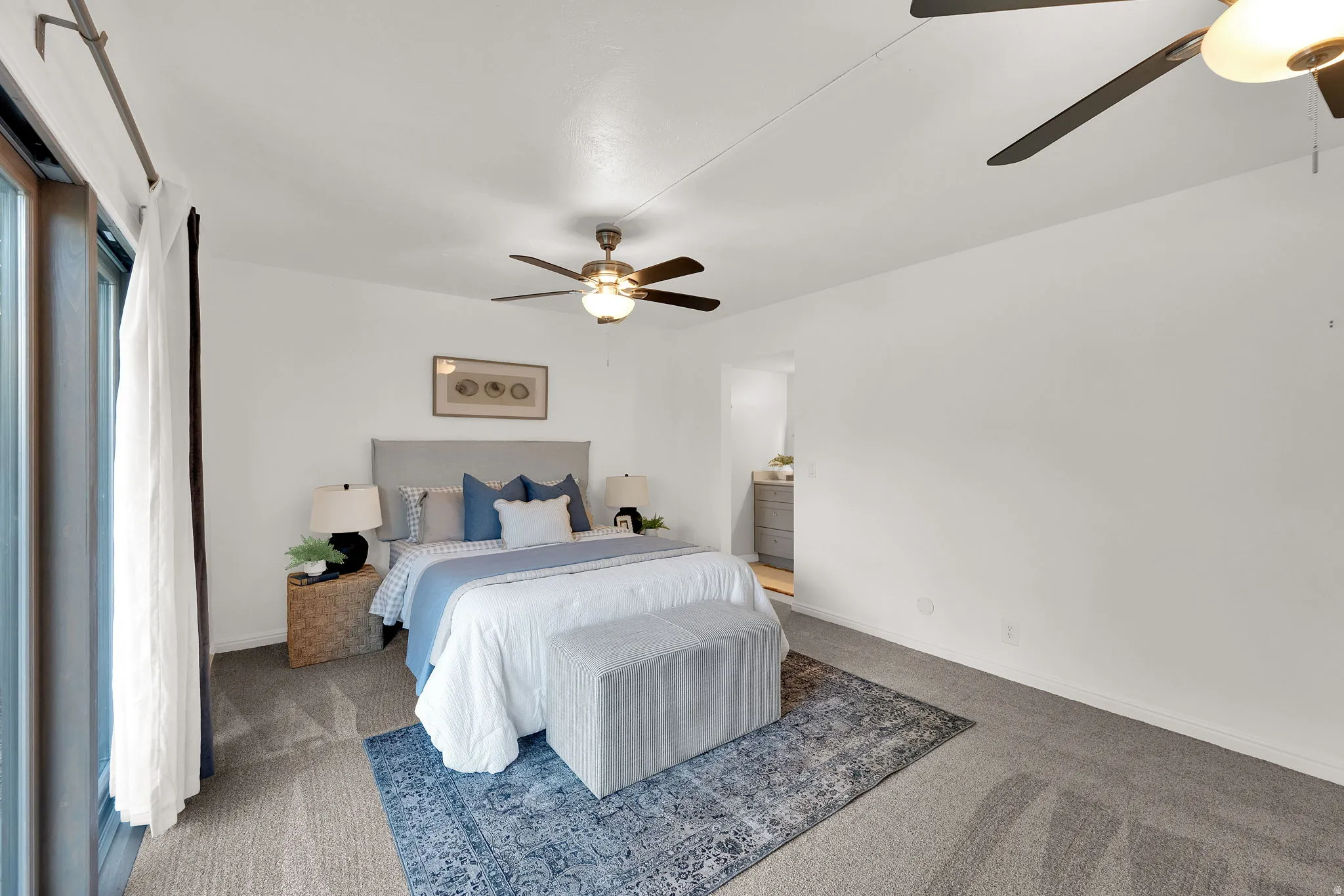 Wall-to-wall carpeting and ceiling fans
