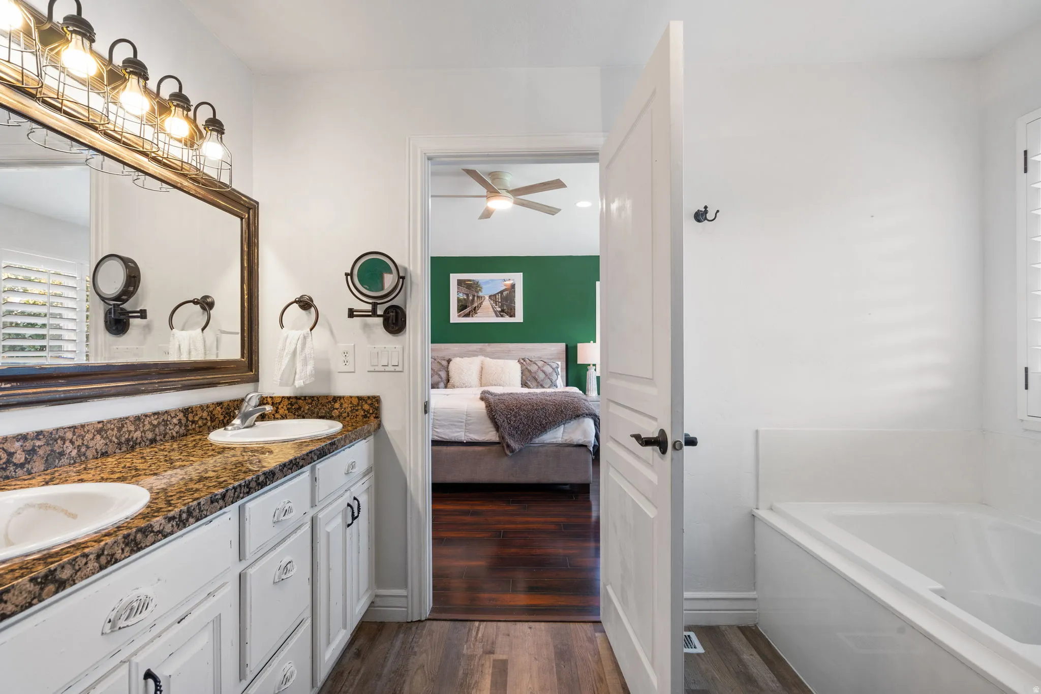 Dual vanity with integrated sinks and a stone-finish countertop
