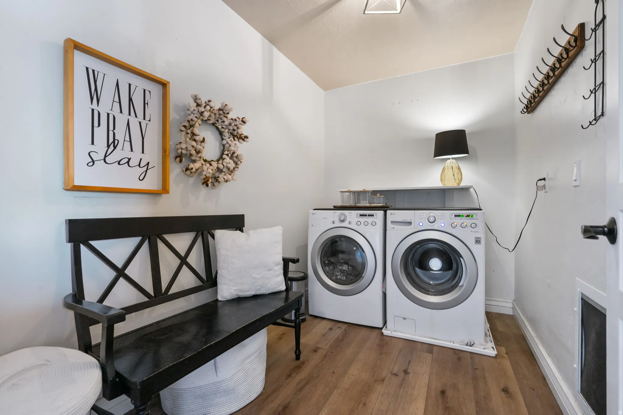 Wood-finish flooring with white wall finishes