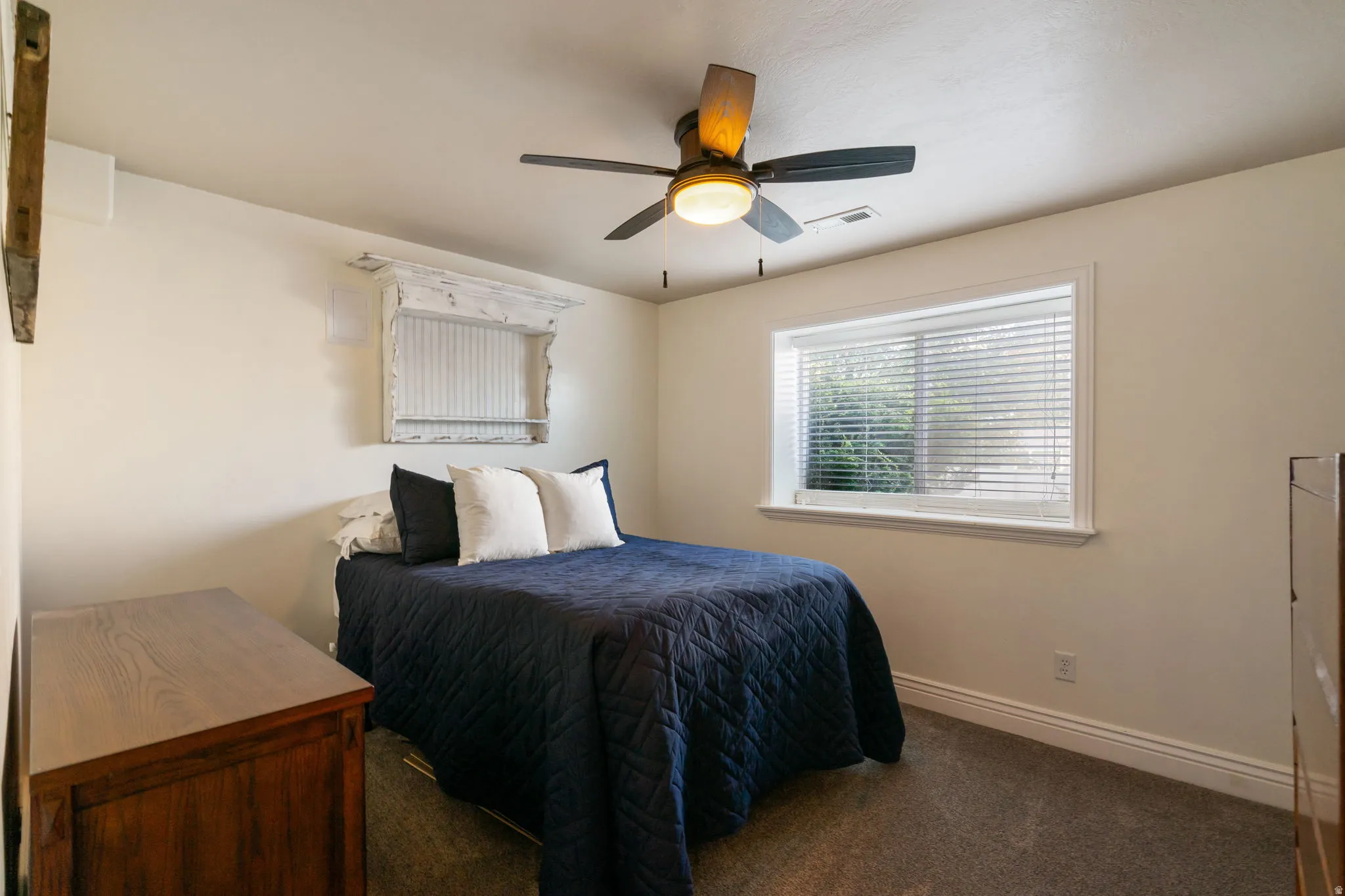 Recessed lighting, ceiling fan with integrated light, neutral carpet flooring, white trim, and a window with blinds