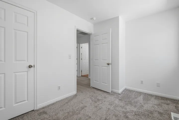 Neutral white wall paint and baseboards