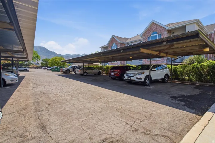 Covered parking space with recently replaced roof