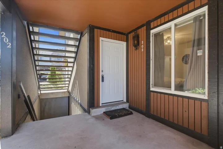 Ground floor main entrance. Second entrance into basement family room located down exterior stairs.
