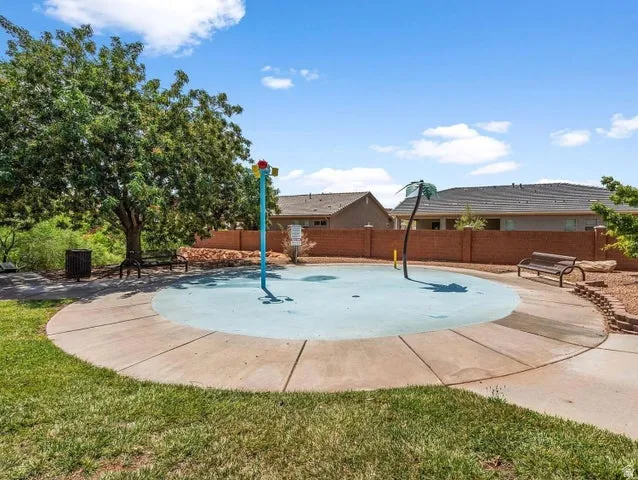 Community splash pad with integrated water features