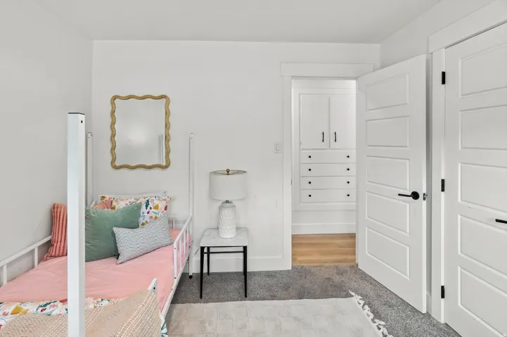White five-panel interior doors with black hardware