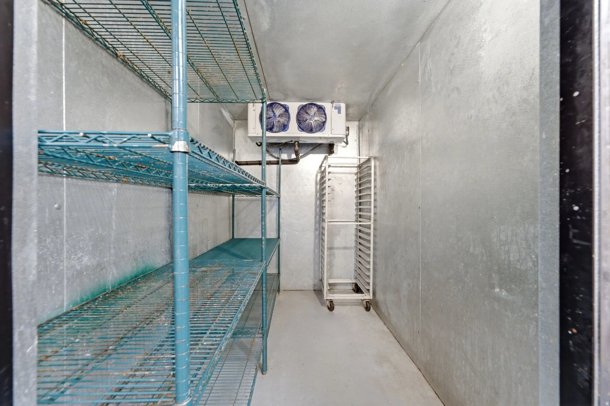 Walk-in freezer with approximately 42 sf with shelving